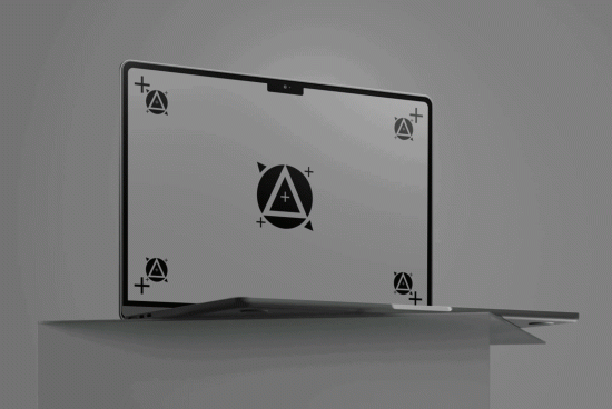 Laptop mockup with geometric wallpaper design on screen, showcasing display for digital assets, ideal for graphic designers.
