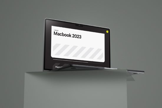 Modern Macbook 2023 mockup with sleek design on a stand, perfect for presentations and web design showcases, editable screen.