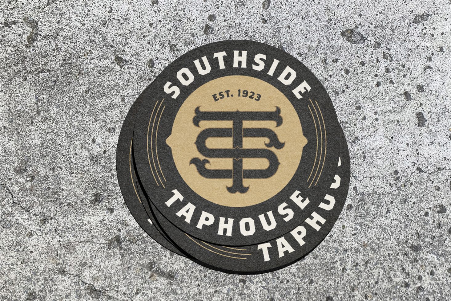 Round vintage coaster mockup for Southside Taphouse with retro fonts, graphics on concrete background. Perfect for beverage branding templates.