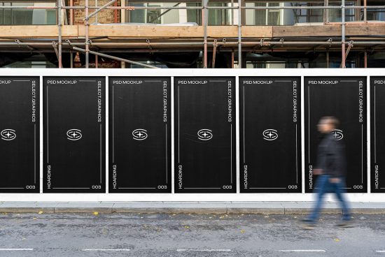 Realistic outdoor advertising PSD mockup with black posters on construction hoarding and blurred person walking by, perfect for graphics display.
