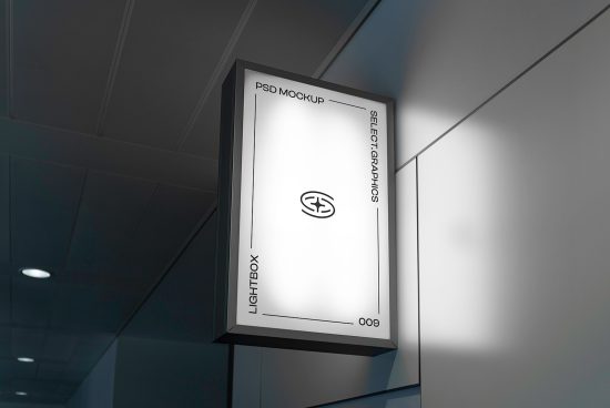 Illuminated hanging poster lightbox mockup in a modern interior setting for graphic design presentations, perfect for designers seeking mockup assets.