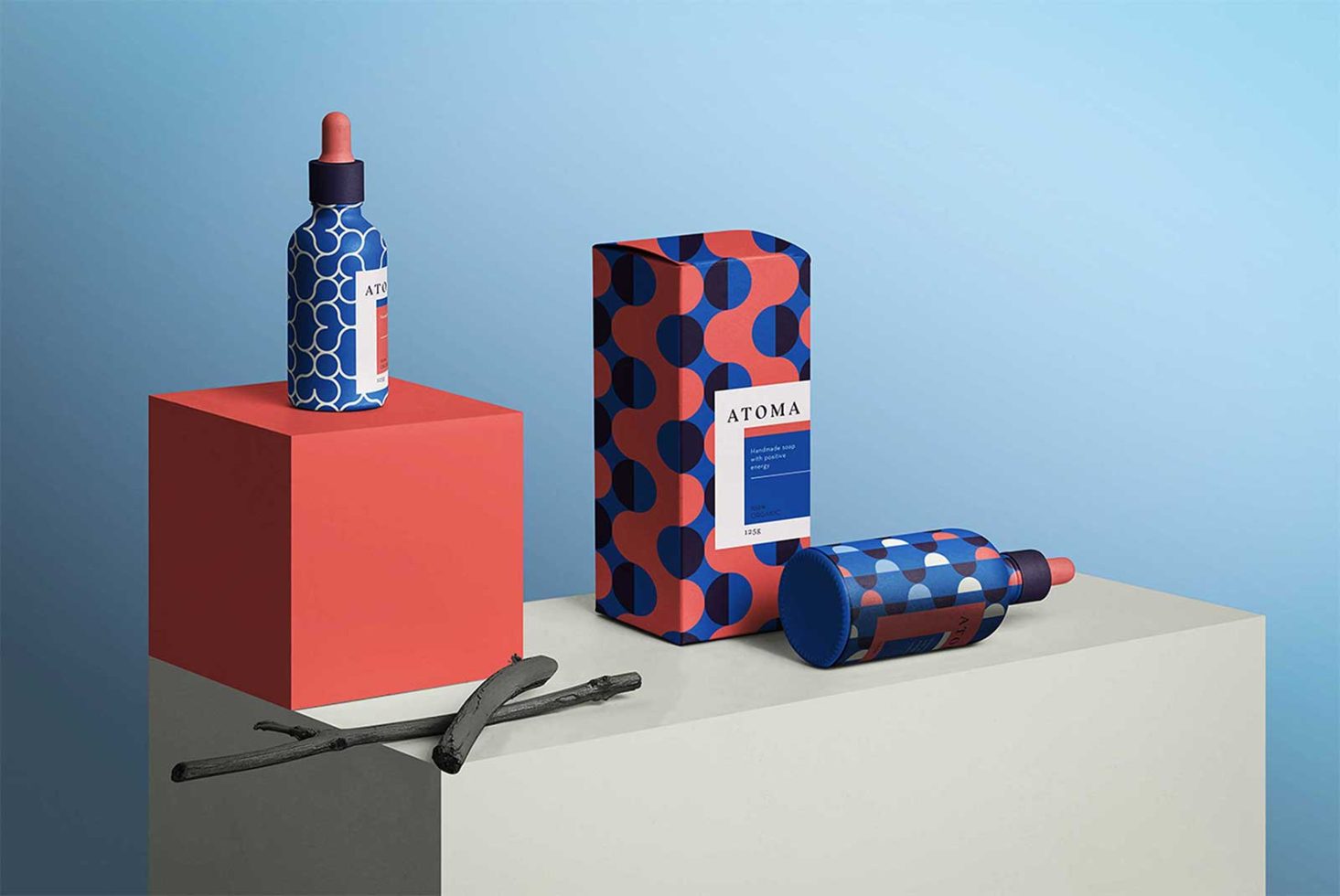 Cosmetic packaging mockup with modern patterns on bottles and boxes displayed on colorful cubes, perfect for design prototype presentations.