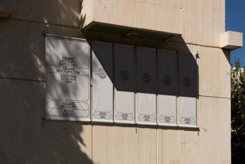 Six white square panels displayed on cream concrete wall with shadow overlay
