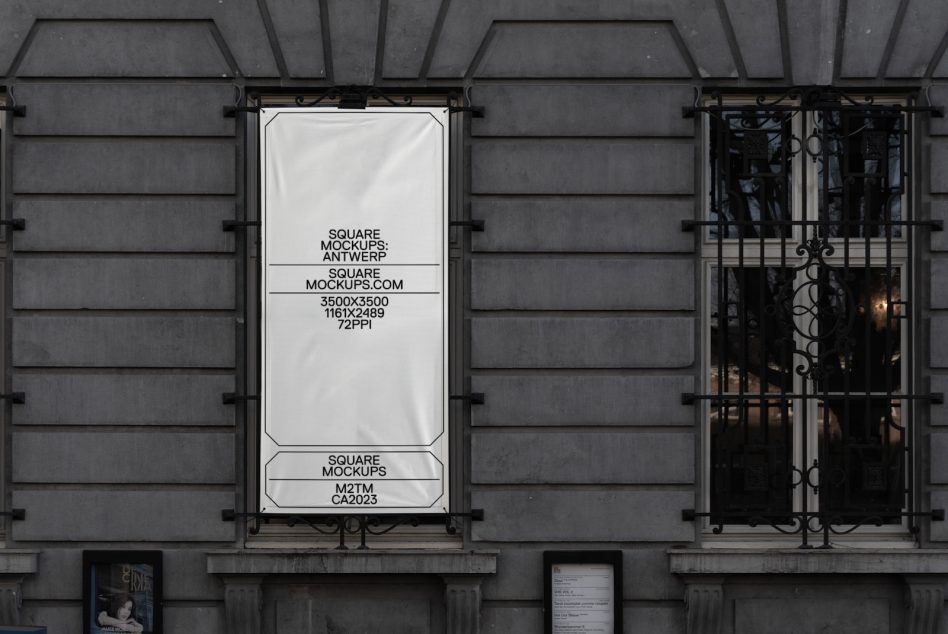 Window display mockup on dark storefront with ornate glass doors