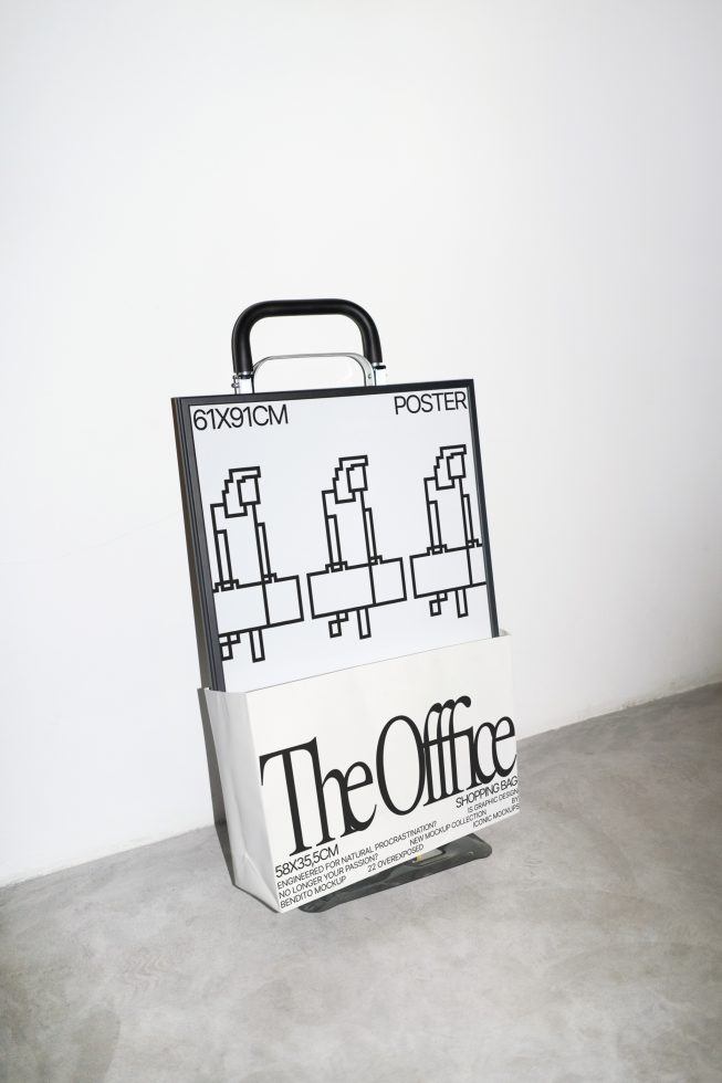 Stylish shopping bag mockup on concrete floor, trendy graphic design for The Office, modern typography, ideal for presentations and branding.