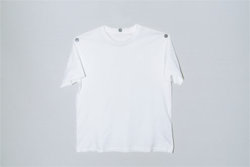 Plain white t-shirt mockup on a simple background, perfect for apparel design presentations and branding projects.