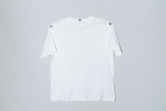 Plain white t-shirt mockup on a simple background, perfect for apparel design presentations and branding projects.