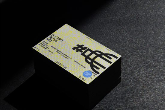 Creative business card mockup on dark texture, with modern graphic design, vibrant yellow and bold typography, perfect for designers portfolio.