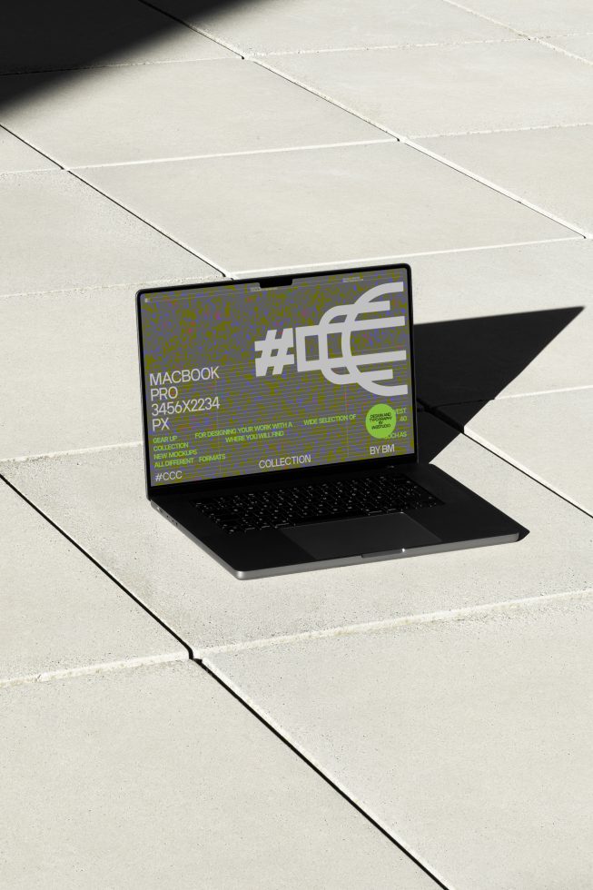 Laptop mockup with a highly detailed screen design on a sunny outdoor paving, ideal for presenting digital designs and graphics.