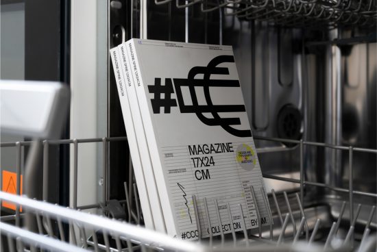Realistic magazine mockup in a dishwasher showcasing unconventional design presentation, perfect for portfolio graphics display.