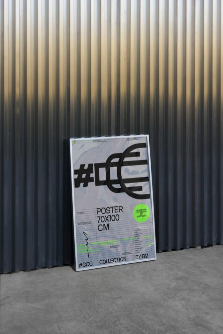 Modern urban poster mockup standing against ribbed metal sheet wall for showcasing design projects to clients, includes space for branding and text.