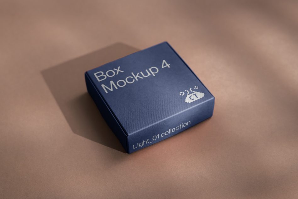 Navy blue square box mockup with textured surface on warm tan background
