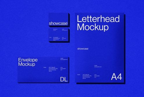 Blue letterhead, envelope, business card mockups displayed on bright blue background
