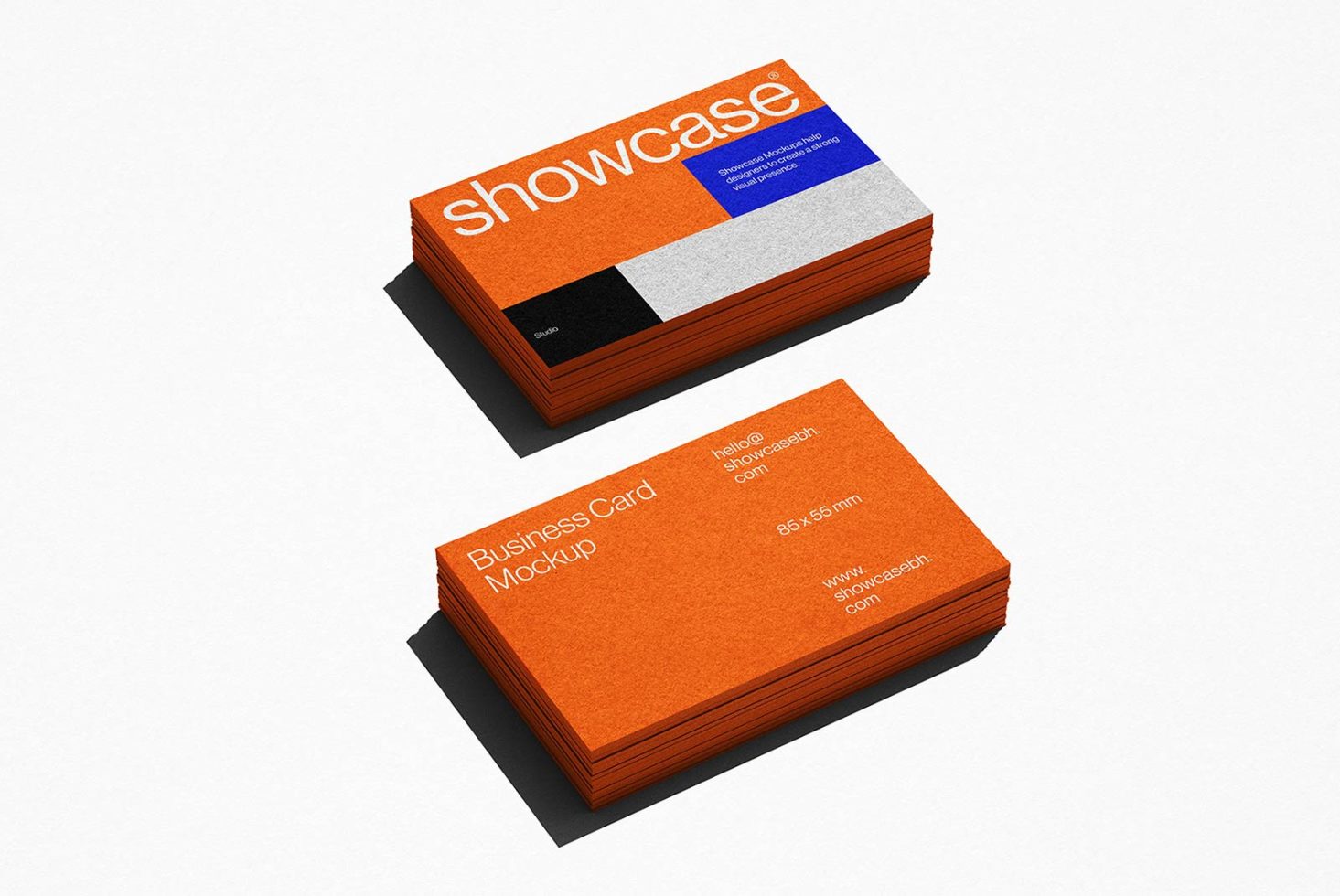 Stack of textured business card mockups with vibrant orange design on a white background, showcasing front and back views for designers.