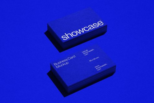 Blue business card mockup with elegant design on a textured background, perfect for professional branding presentations.