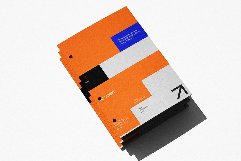 Graphic design presentation mockup with vibrant orange and grey paper layouts stacked, ideal for branding and portfolio showcases.