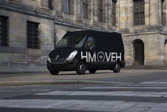 Black delivery van mockup with branding space, parked on urban street for advertising design presentation, realistic vehicle template.