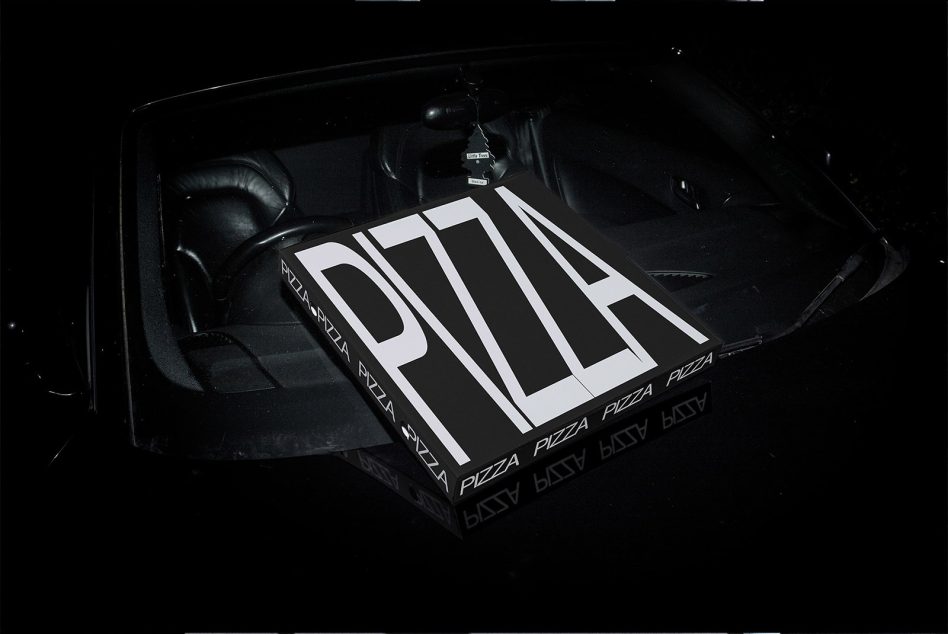 Bold typography PIZZA design showcased on a sleek car sunshade, ideal for graphics display and vehicle mockup design presentations.