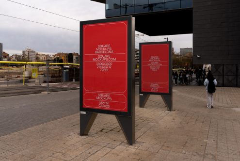 Double A-frame street signage mockups in public plaza with red panels