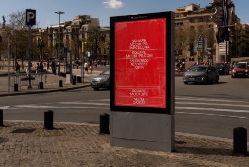 Street-level billboard mockup in Barcelona plaza with red display
