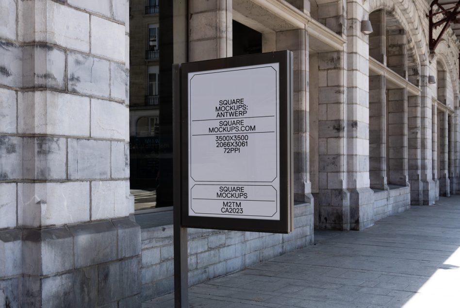 Street-mounted square sign mockup on weathered stone building facade with minimal branding text