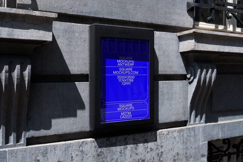 Concrete wall with bright blue neon sign glowing in daylight with metal frame