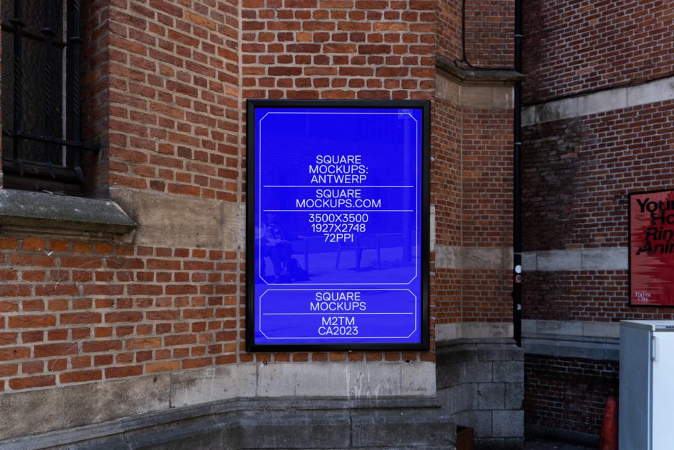 Bright blue neon sign on brick wall with white text inside black frame box