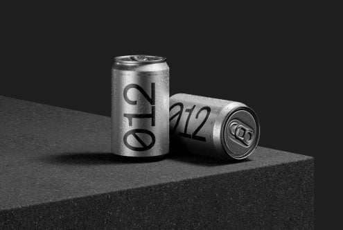 Realistic soda can mockup with condensation on dark background, perfect for product design presentations and packaging mockups.