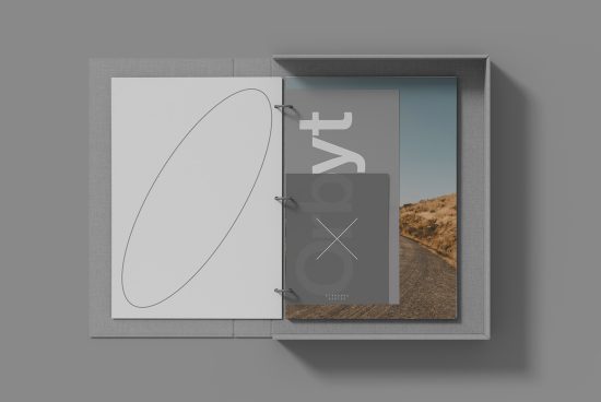 Elegant magazine mockup with open box packaging, showcasing abstract cover design and landscape photography, ideal for designers' presentations.
