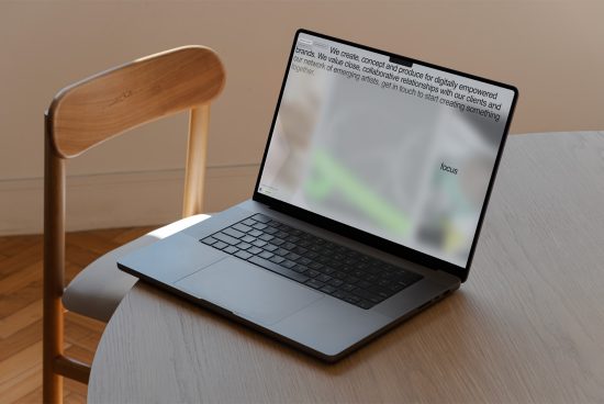 Laptop on wooden desk with text on screen, modern minimalist workspace, professional design template mockup for presentations.