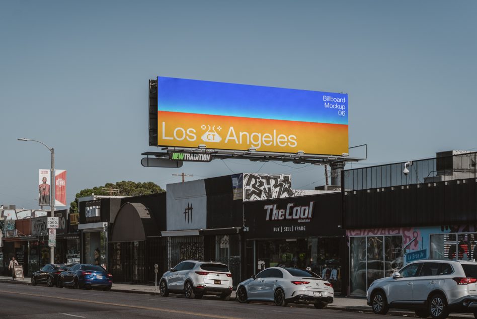 Colorful gradient billboard with Los Angeles design against blue sky above street