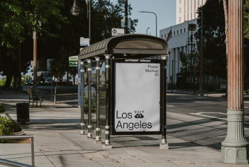 Bus shelter with white background poster displaying Los Angeles branding in clean layout