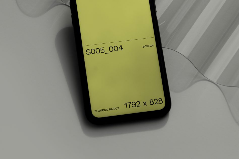 Bright yellow phone screen showing s005_004 specs on diagonal striped backdrop