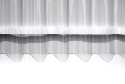 Wavy corrugated ribbon bands stacked vertically on light gray background