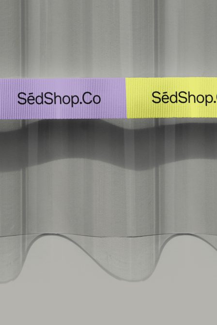 Horizontal ribbon stripes in purple yellow with SedShop.Co text overlay