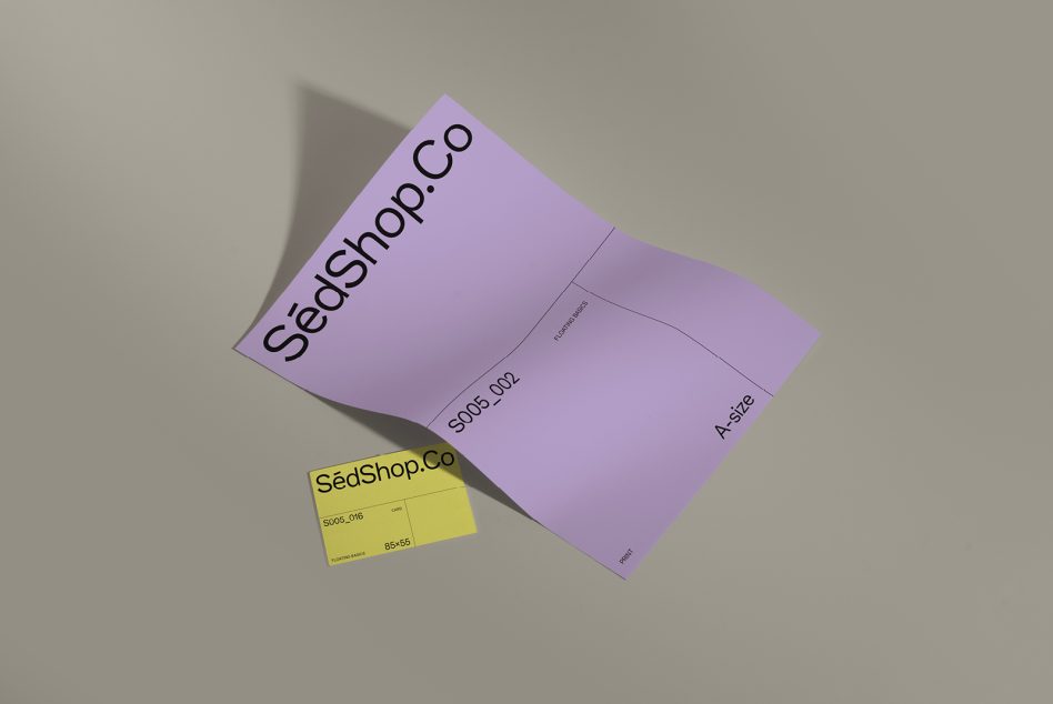 Open lavender A-size brochure showing SedShop.Co logo with matching yellow business card