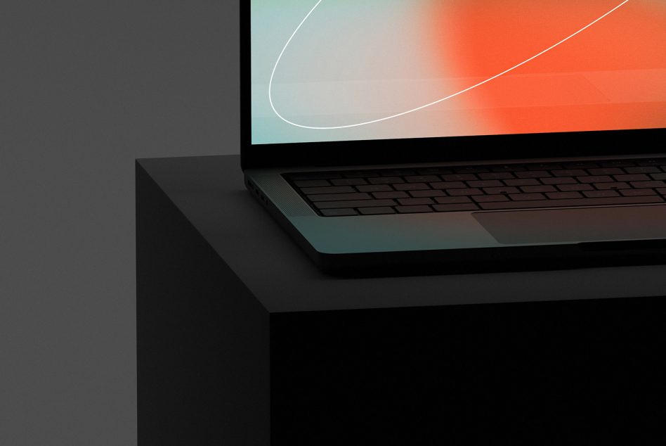 Stylish laptop mockup on dark desk, screen with gradient design, showcasing modern device display for templates category.