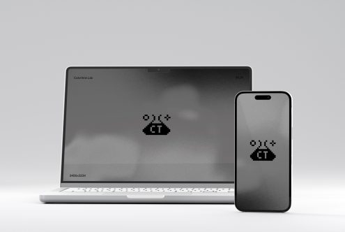 Laptop with phone mockup displaying matching dark interface side by side