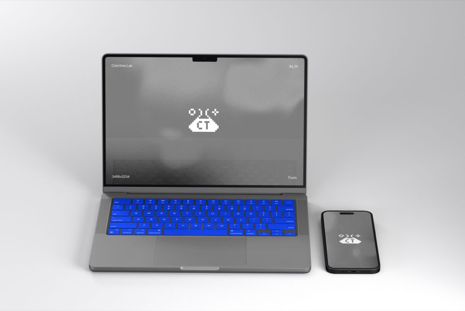 Gray laptop with bright blue keyboard cover paired with small smartphone mockup