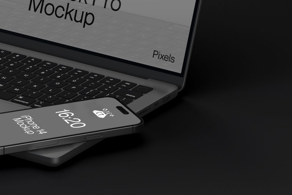 Black laptop with smartphone showing editable screen mockup on dark background