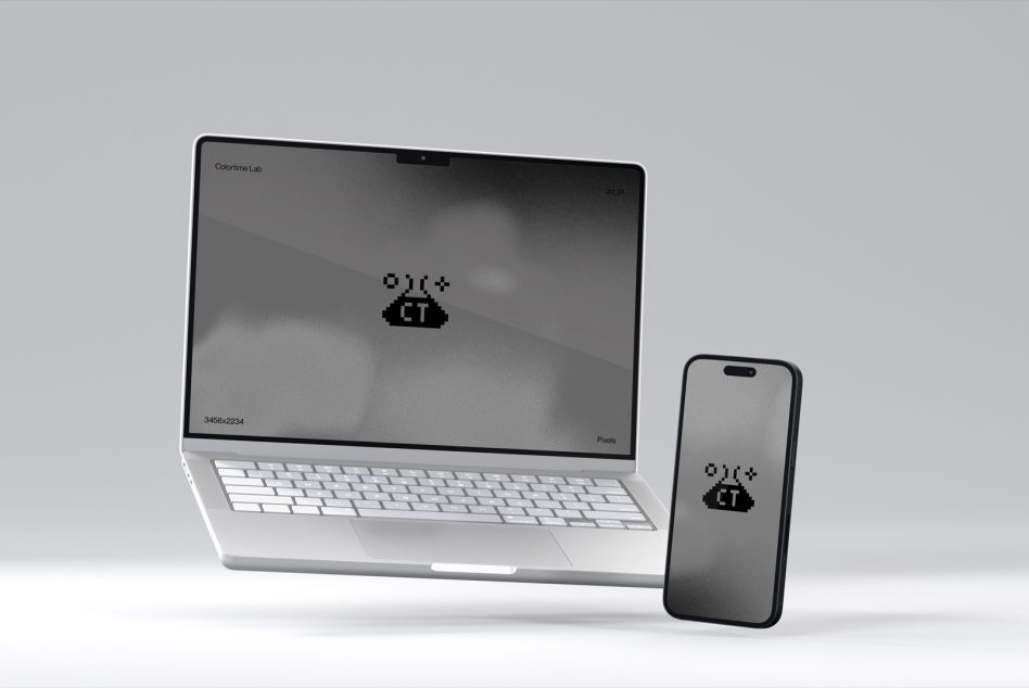 Silver laptop next to smartphone both showing pixelated cloud icon on screen