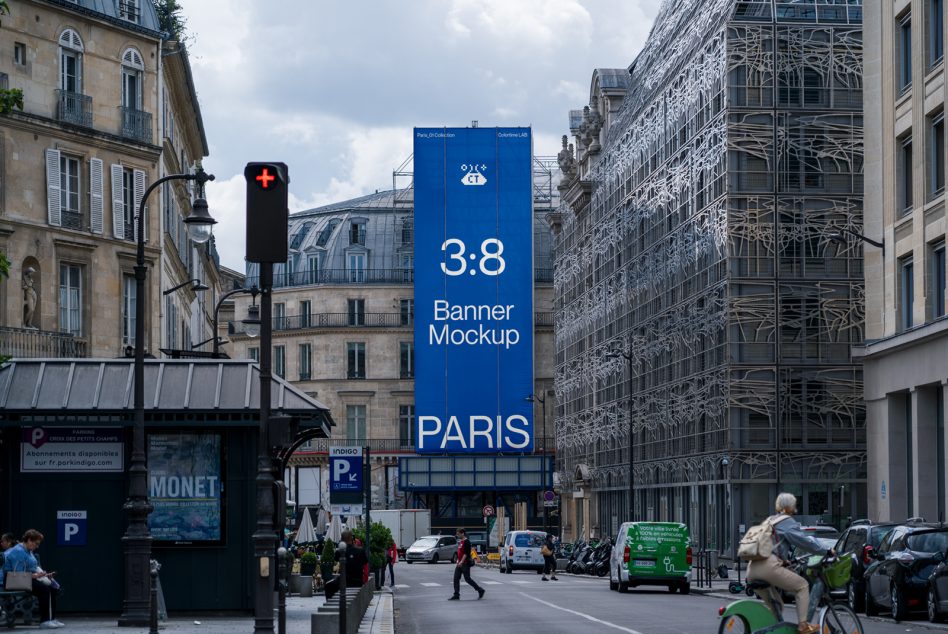Blue vertical banner on Paris avenue, 3:8 ratio, crowded urban setting