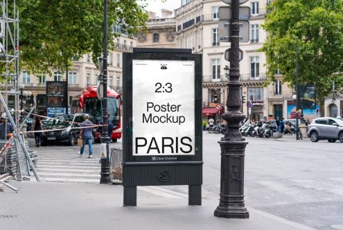 White 2:3 poster mockup on square pole surrounded by historic buildings