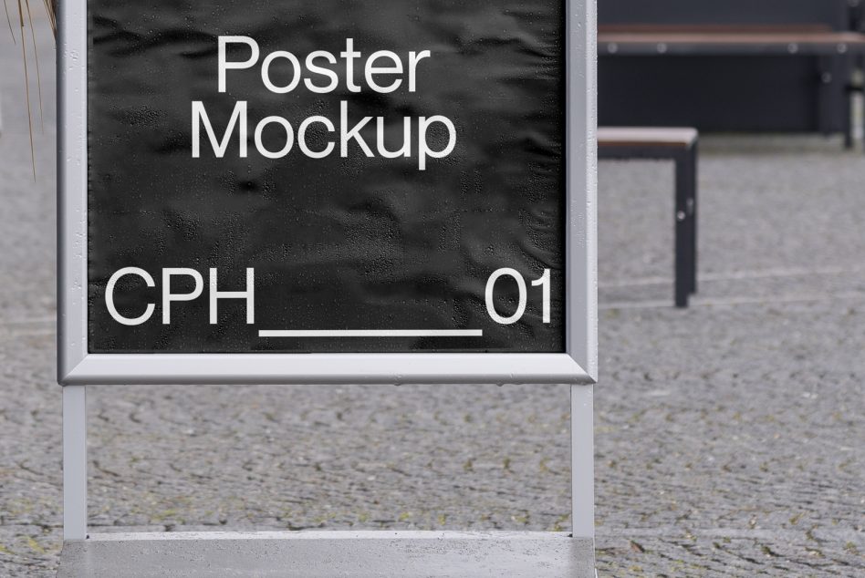 Outdoor sidewalk sign with white frame showing black poster mockup layout