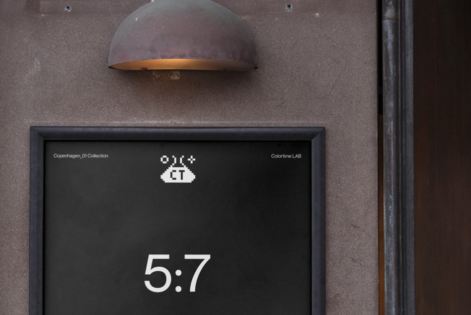 Dark wall with framed poster mockup showing 5:7 ratio layout with minimal text