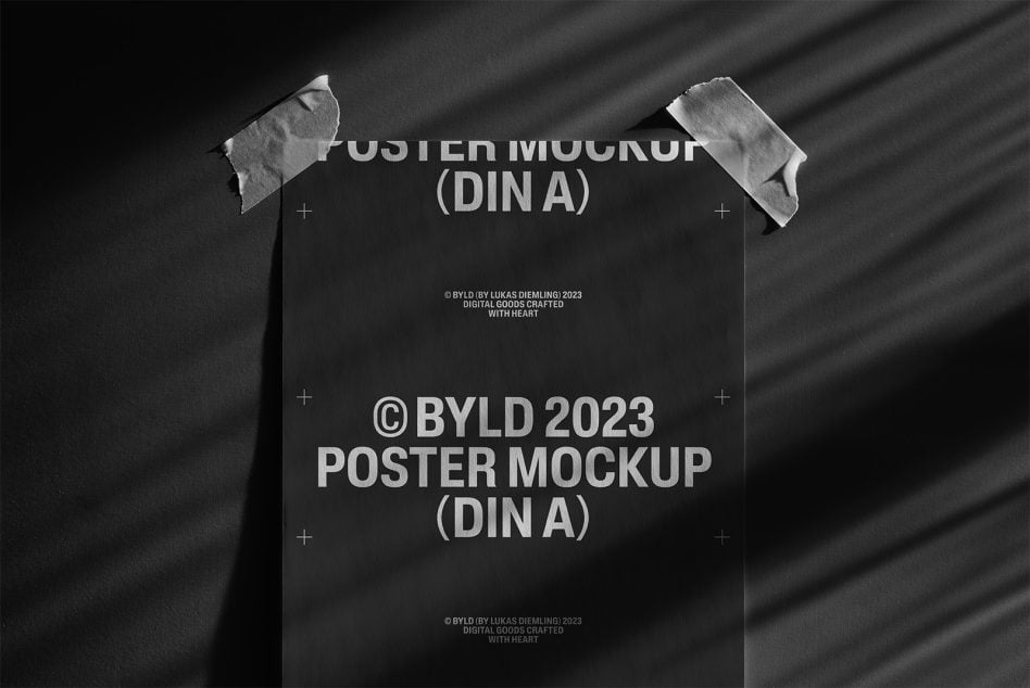 DIN A poster mockup with white paper held by gray tape on dark background