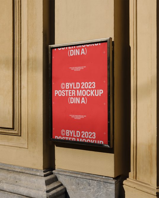 Red poster mockup on beige wall for presenting design work, ideal for graphic designers, realistic urban setting, editable smart object.