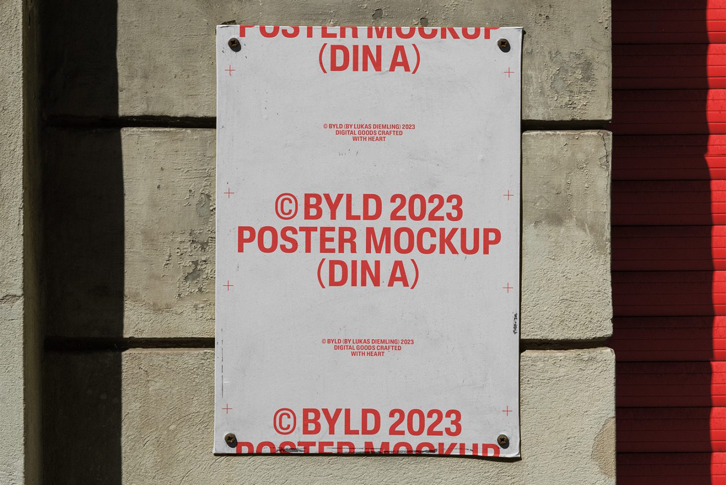 Urban poster mockup on concrete wall with red accents, perfect for designers to showcase graphic work in a realistic setting.