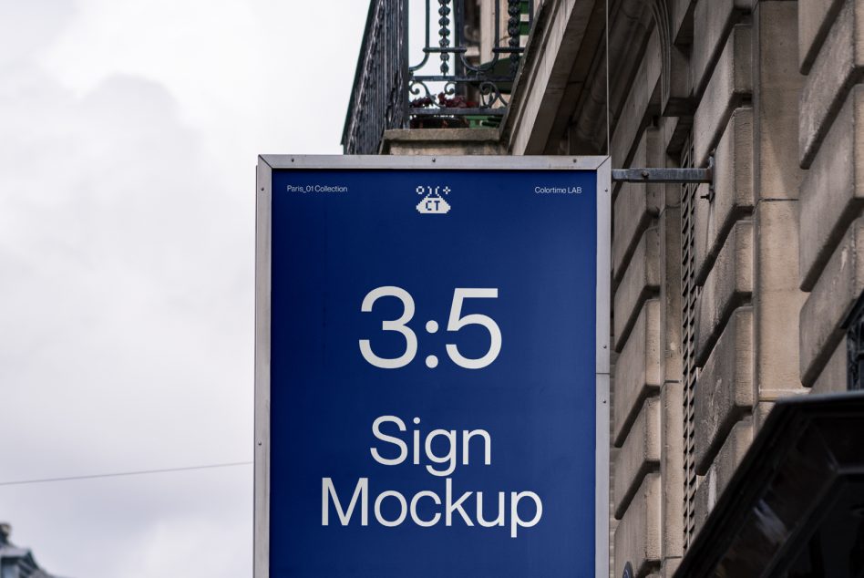 Large vertical blue sign on Haussmann building with 3.5 ratio display