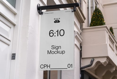 White vertical sign mockup 6:10 ratio on bracket outside entryway, CPH_01
